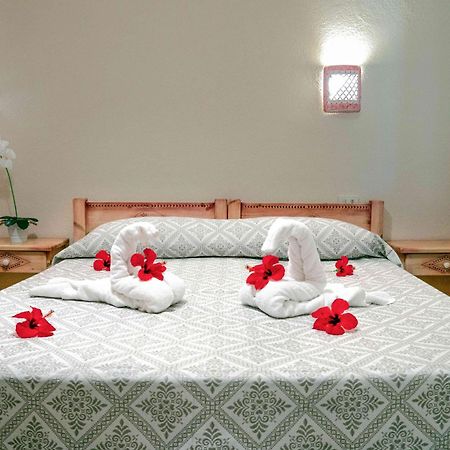 Hotel L'Oleandro Виласимиус Екстериор снимка